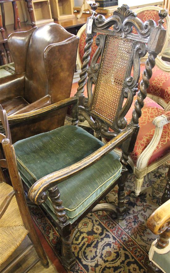 A Carolean style walnut elbow chair,